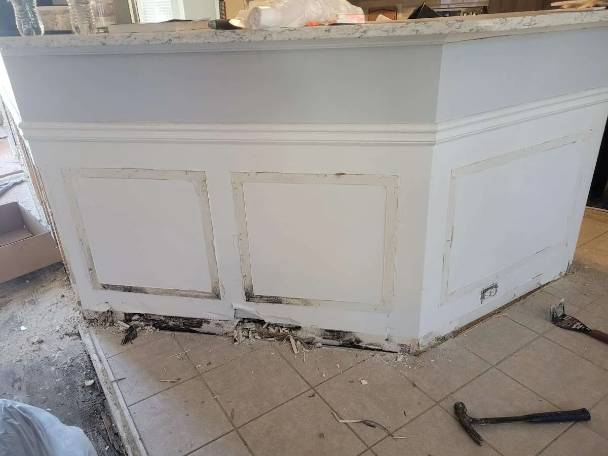Water damage and mold on kitchen during Storm Damage Restoration in West Bend